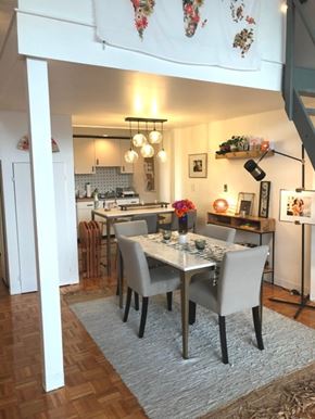 Boston apartment for rent - A dining room with a table set for four.
