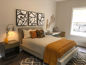 Elizabeth apartment for rent - a bedroom with a bed and art on the wall