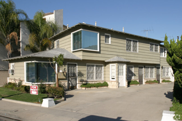 Long Beach apartment for rent - A house with a "For Sale" sign in front of it.