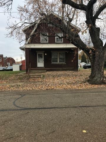 Canton apartment for rent - A house with a tree in front of it.
