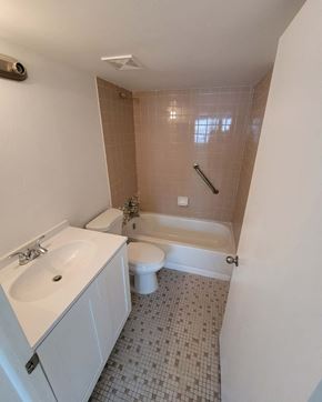 Miami Beach apartment for rent - a bathroom with a sink toilet and a bath tub