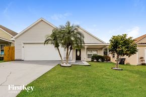 Davenport house for rent - a home with two palm trees in front of it
