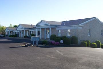 Harville apartment for rent - A building with a parking lot in front of it.