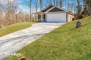 Kannapolis house for rent - A house with a garage is shown in the image.