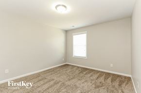 Sherrills Ford house for rent - the second bedroom with carpet and a window