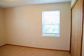 Jefferson City apartment for rent - a bedroom with a window and a closet