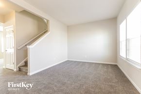 Camby house for rent - a bedroom with a carpeted floor and white walls
