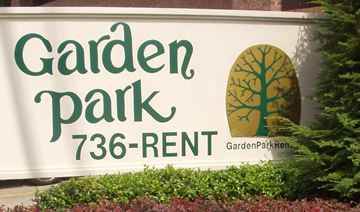 Huntington house for rent - a sign for garden park in front of a building