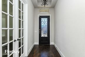 Mansfield house for rent - a view of the front door of a house with a wrought iron gate