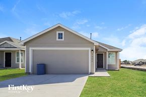 San Antonio house for rent - A two-car garage is attached to a house.