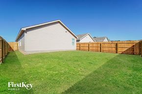 San Antonio house for rent - A house with a fence and a grassy yard.