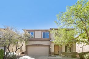 San Tan Valley house for rent - a house with a garage and trees in front of it