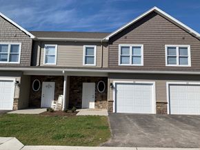 Penn Yan apartment for rent - a tan and brown house with white doors