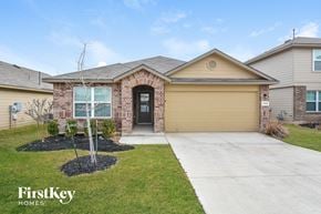 San Antonio house for rent - A house with a garage and a driveway is for sale.