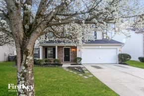 Kannapolis house for rent - A house with a tree in front of it.