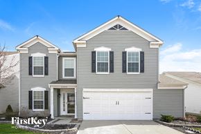 Franklin house for rent - a gray house with a white garage door