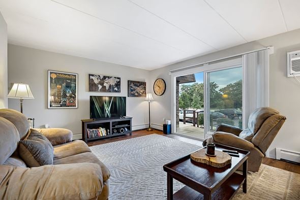 Lemont apartment for rent - a living room with couches and a coffee table and a sliding glass door