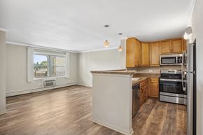 Evergreen Park apartment for rent - an empty kitchen with an island in the middle