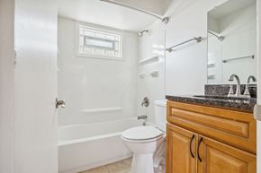 Evergreen Park apartment for rent - a bathroom with a shower and a toilet and a sink