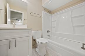 Sleepy Hollow apartment for rent - a bathroom with a toilet and a tub and a sink