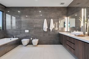 Beverly Hills apartment for rent - A bathroom with a tub, toilet, and sink.