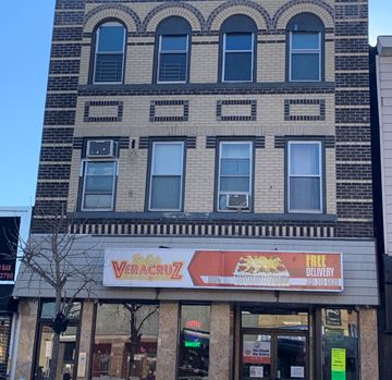 West New York apartment for rent - A building with a Veracruz restaurant on the ground floor.