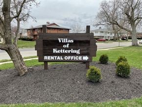 Kettering apartment for rent - a sign for the villas of??tering rental office in front of a