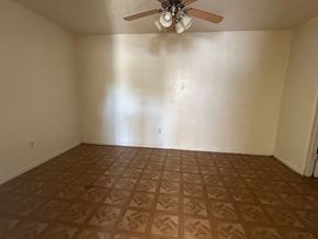 Copperas Cove apartment for rent - an empty living room with a ceiling fan