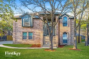 Denton house for rent - an old brick house with trees in front of it
