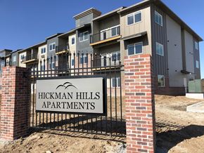 Hickman apartment for rent - a sign apartments in front of an apartment building