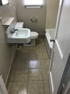Lafayette apartment for rent - a bathroom with a sink and a toilet and a tub