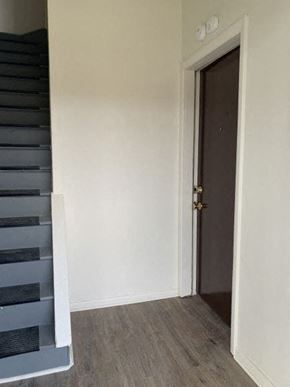East Mckeesport apartment for rent - A white door with a brass handle is closed.