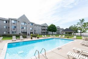 Coon Rapids apartment for rent - the preserve at ballantyne commons pool and apartment building