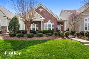 Indian Trail house for rent - a home with a front yard and green grass