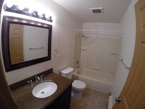 Fairbanks apartment for rent - A bathroom with a sink, toilet, and bathtub.