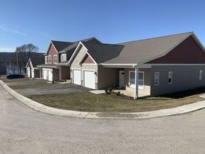 Penn Yan apartment for rent - a row of houses with a street in front of them
