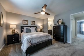 Apex apartment for rent - Bedroom with queen bed, dresser and night stands