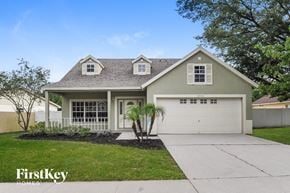 Riverview house for rent - A house with a garage and a driveway in front of it.