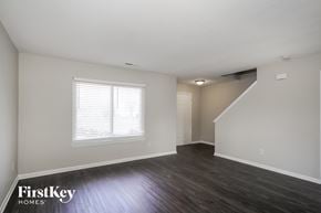 Franklin house for rent - the living room of an apartment with wood flooring and a window