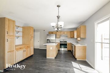Franklin house for rent - a large kitchen with wooden cabinets and stainless steel appliances