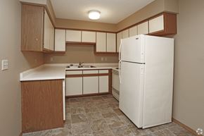 Hutchinson apartment for rent - Kitchen with white and brown cabinets