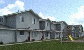 Morris townhouse for rent - a row of houses with a playground in the yard