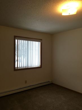 Morris townhouse for rent - the living room of an empty house with a window