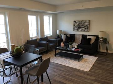 Tillsonburg apartment for rent - a living room with a couch and a table