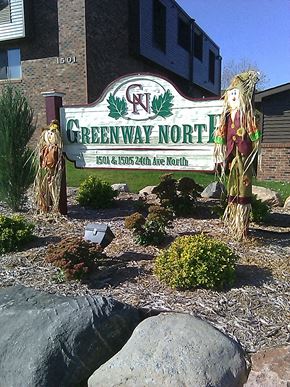 St Cloud apartment for rent - a sign for greenway north in front of a building