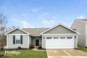 Greenwood house for rent - A grey house with a white garage door and a black door.