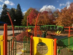 Minneapolis apartment for rent - a playground with a green and yellow gate