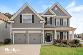 Sherrills Ford house for rent - a gray house with a front porch and a driveway