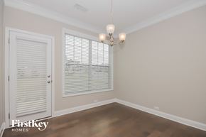 Sherrills Ford house for rent - a dining room with a window and a chandelier