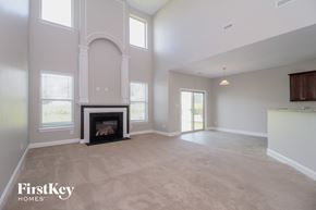 Lexington house for rent - the living room of a new home with a fireplace